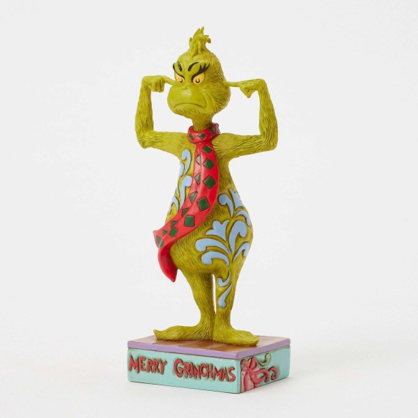 GRINCH PLUGGING EARS