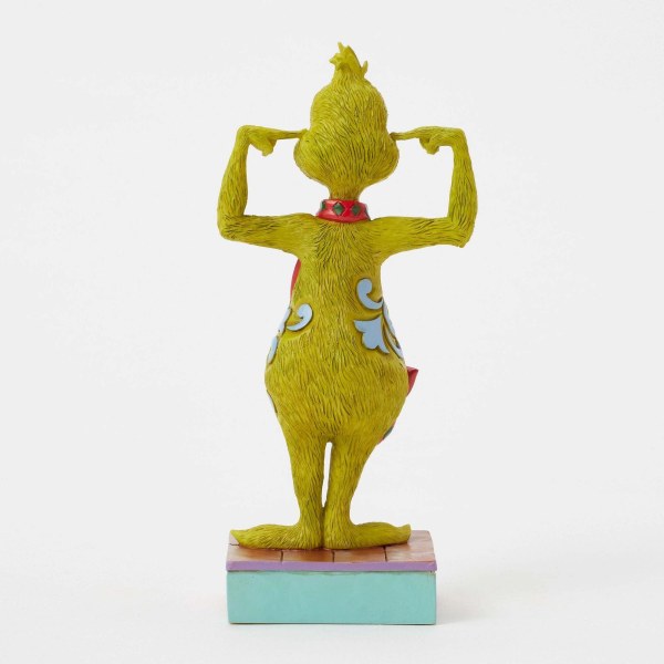 GRINCH PLUGGING EARS