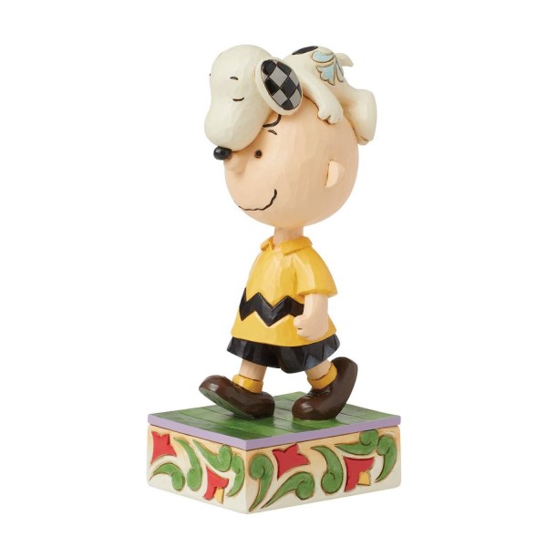 Snoopy on Charlie Brown's head- Peanuts