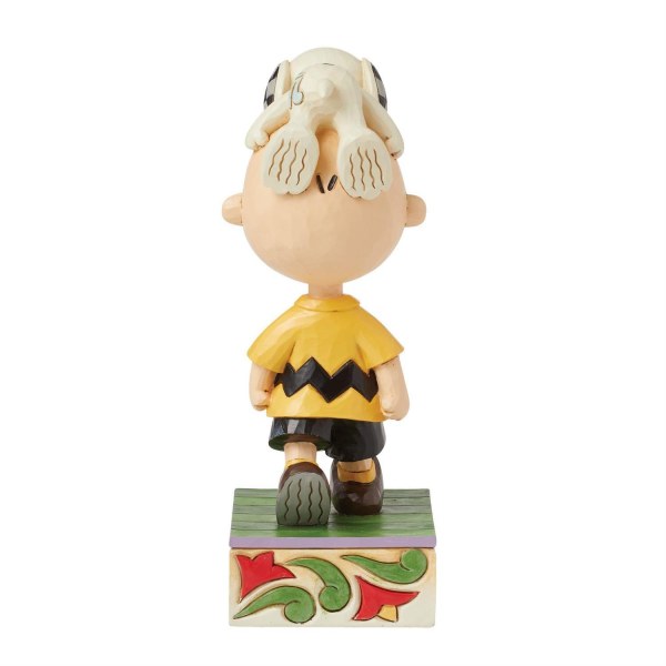 Snoopy on Charlie Brown's head- Peanuts