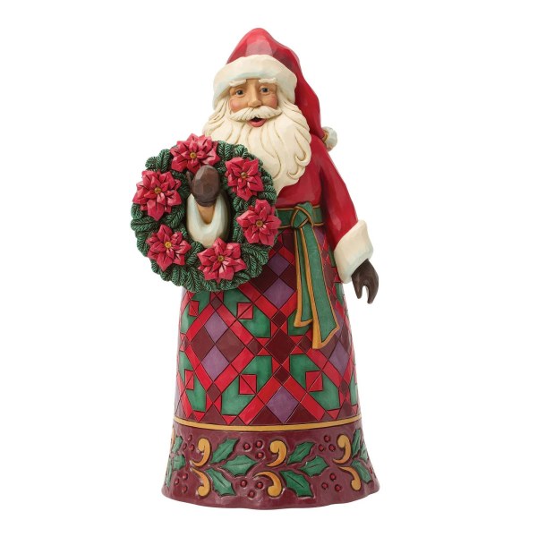 Santa with poinsettia figure - Heartwood Creek