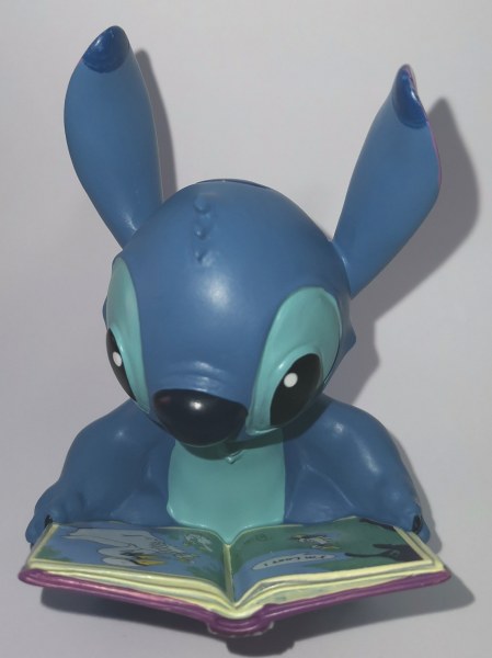 MINI STITCH WITH BOOK - DISNEY SHOWCASE