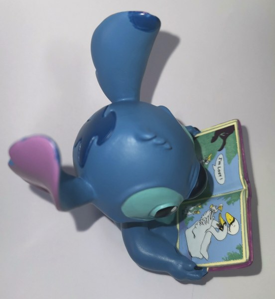MINI STITCH WITH BOOK - DISNEY SHOWCASE