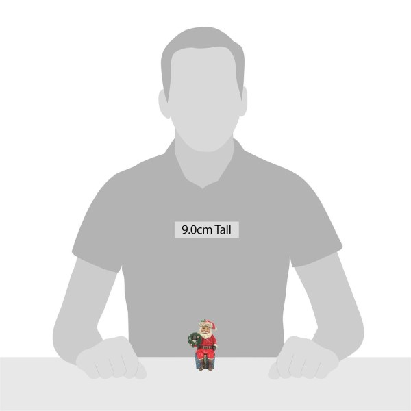 SANTA CLAUS SITTING ON A GIFT - JIM SHORE HEARTWOOD CREEK